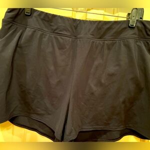 Lands End, size 14, black swim short with attached panty